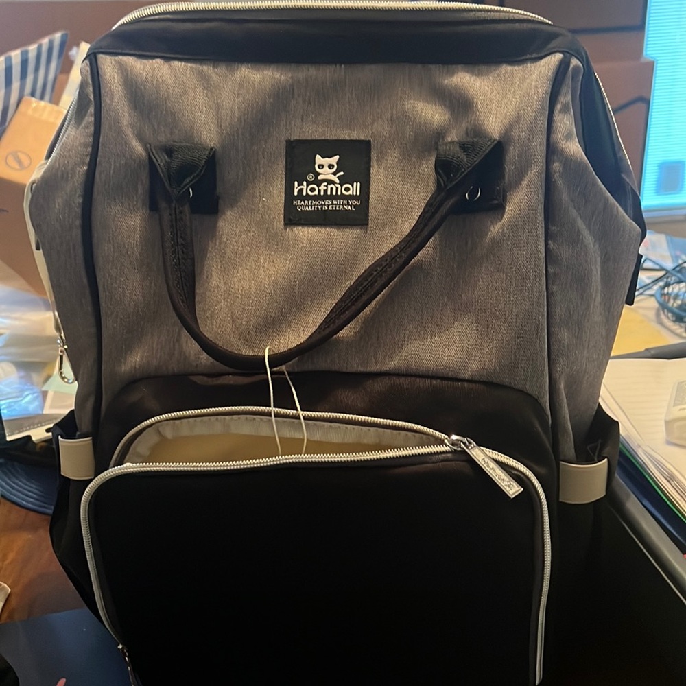 Black and grey diaper bag used once. I have two, so I need one to go.